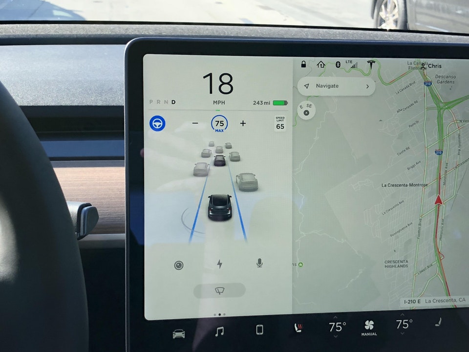 Tesla Autopilot visualization showing cars and lanes detected